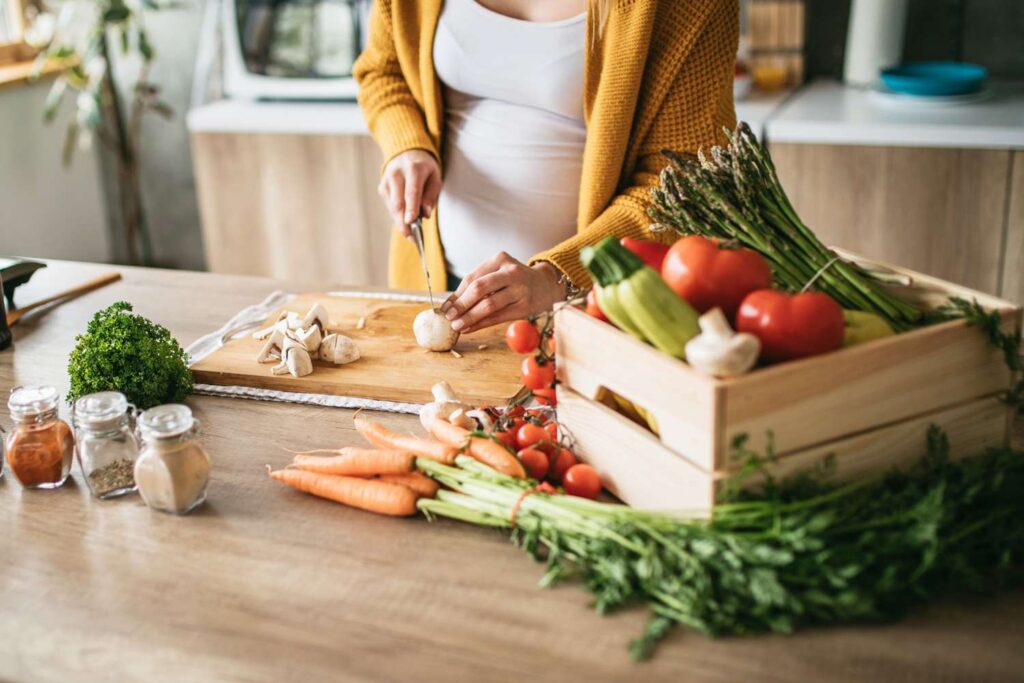 Pregnant-woman-cutting-mushrooms-031325-tout-e5a8f683ec9d455a95368ddccbb9df5d.jpg